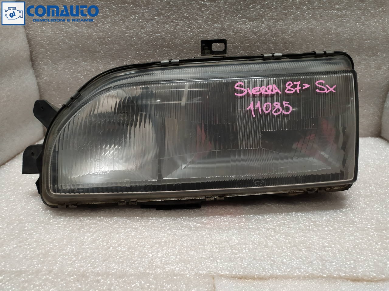 Faro ant sx FORD SIERRA