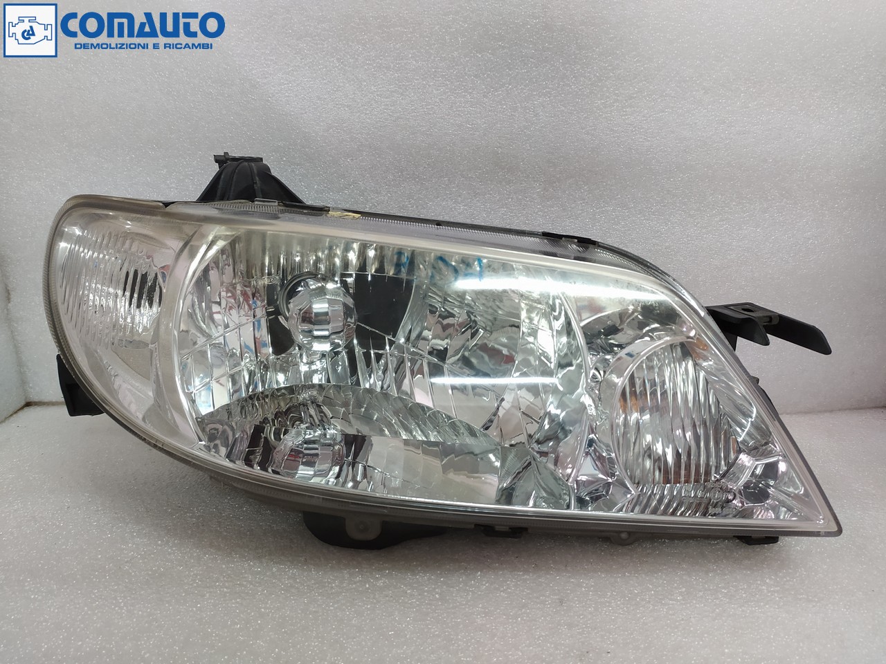 Faro ant dx MAZDA 323