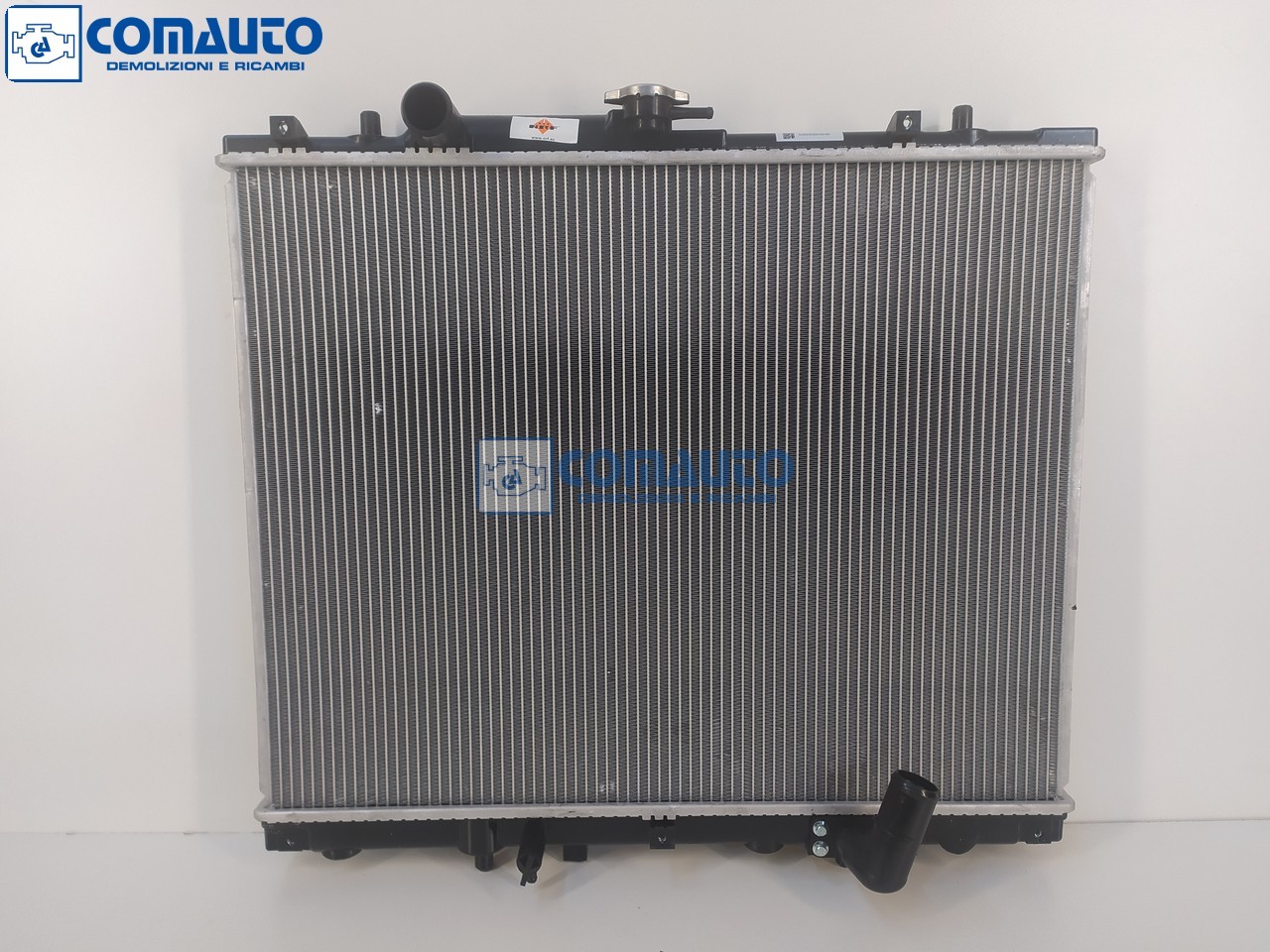 Radiatore acqua MITSUBISHI L200 (K7_T, K6_T, K5_T) '00