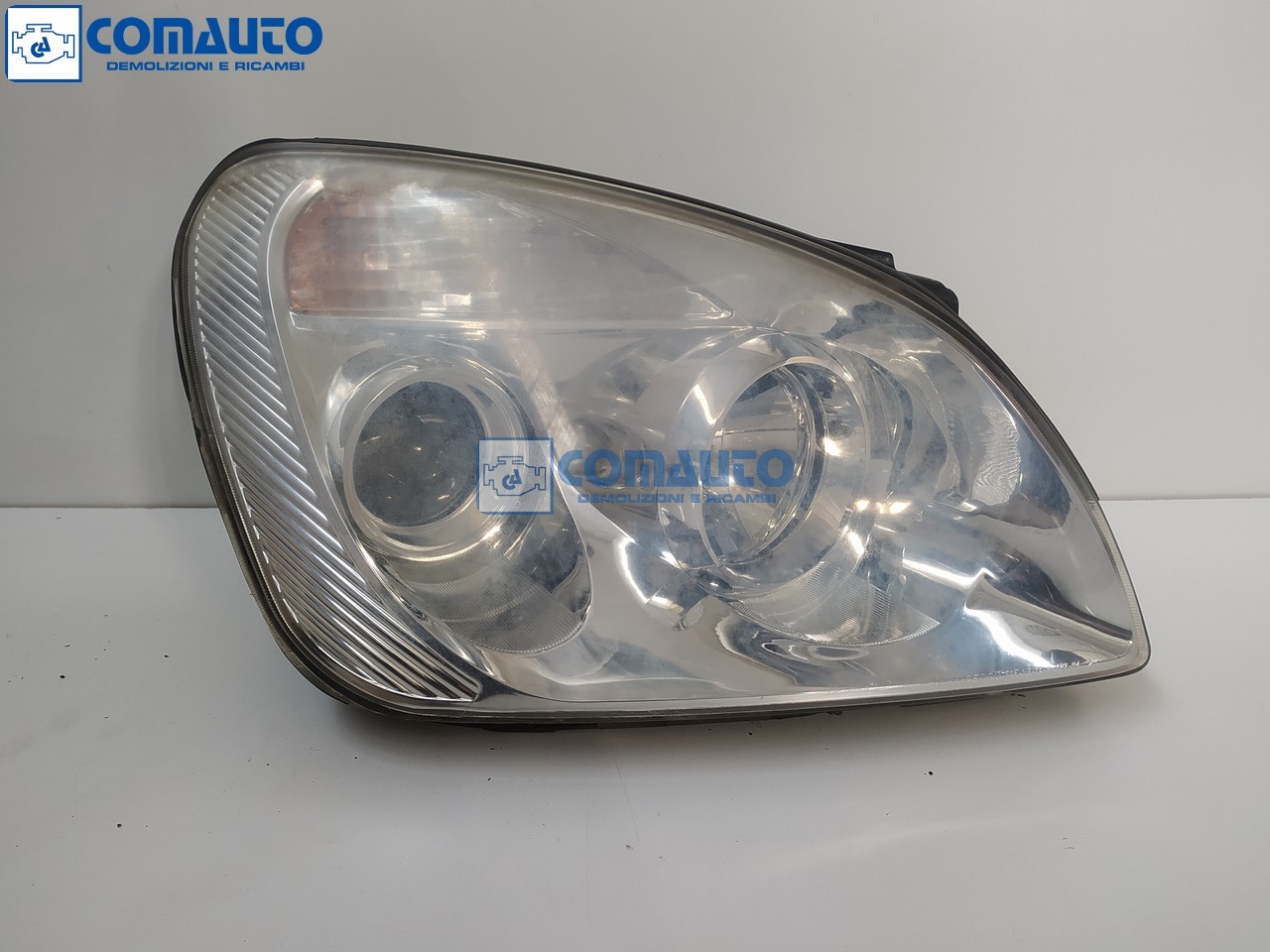 Faro ant dx KIA CARENS