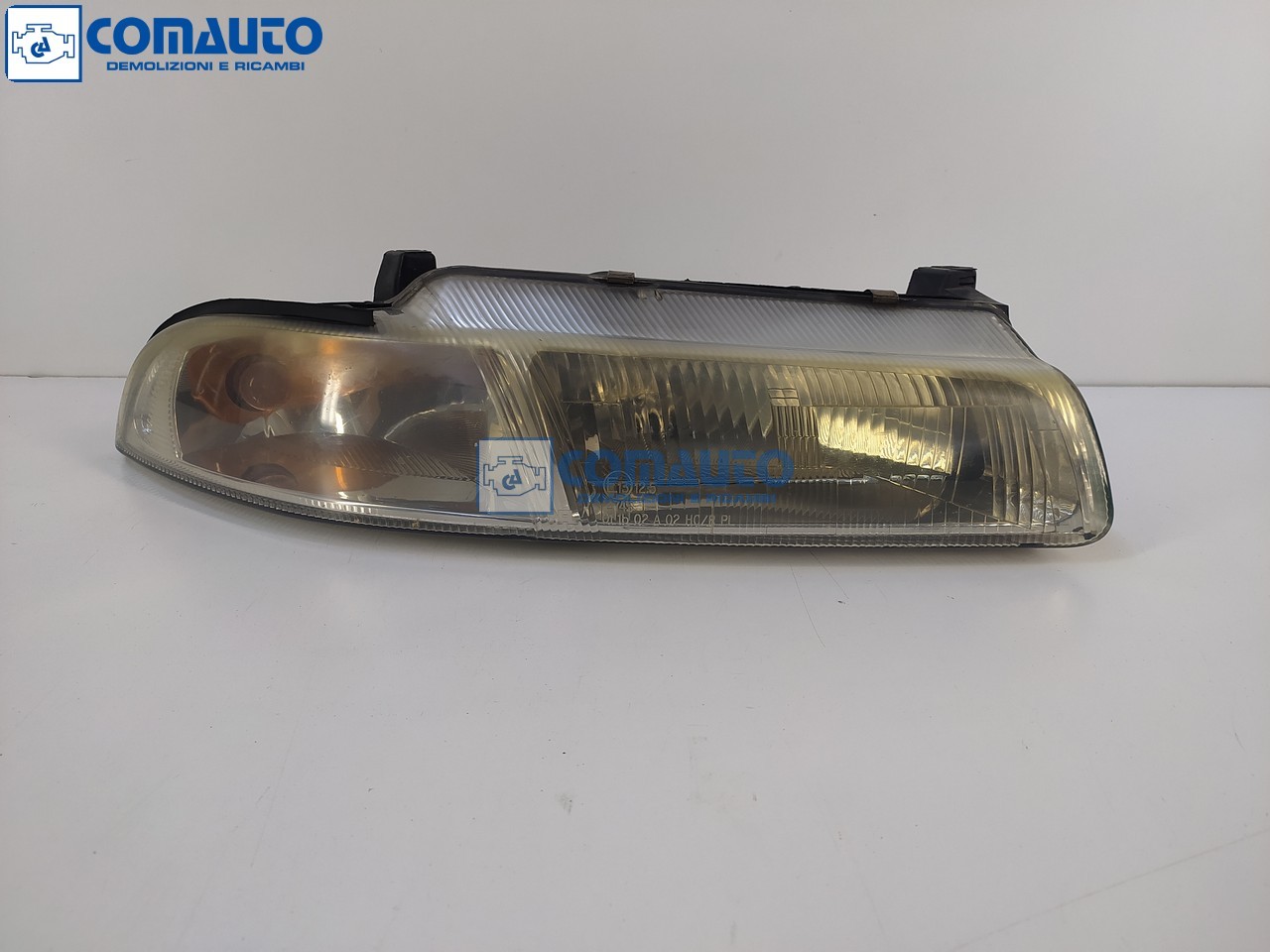 Faro ant dx CHRYSLER STRATUS