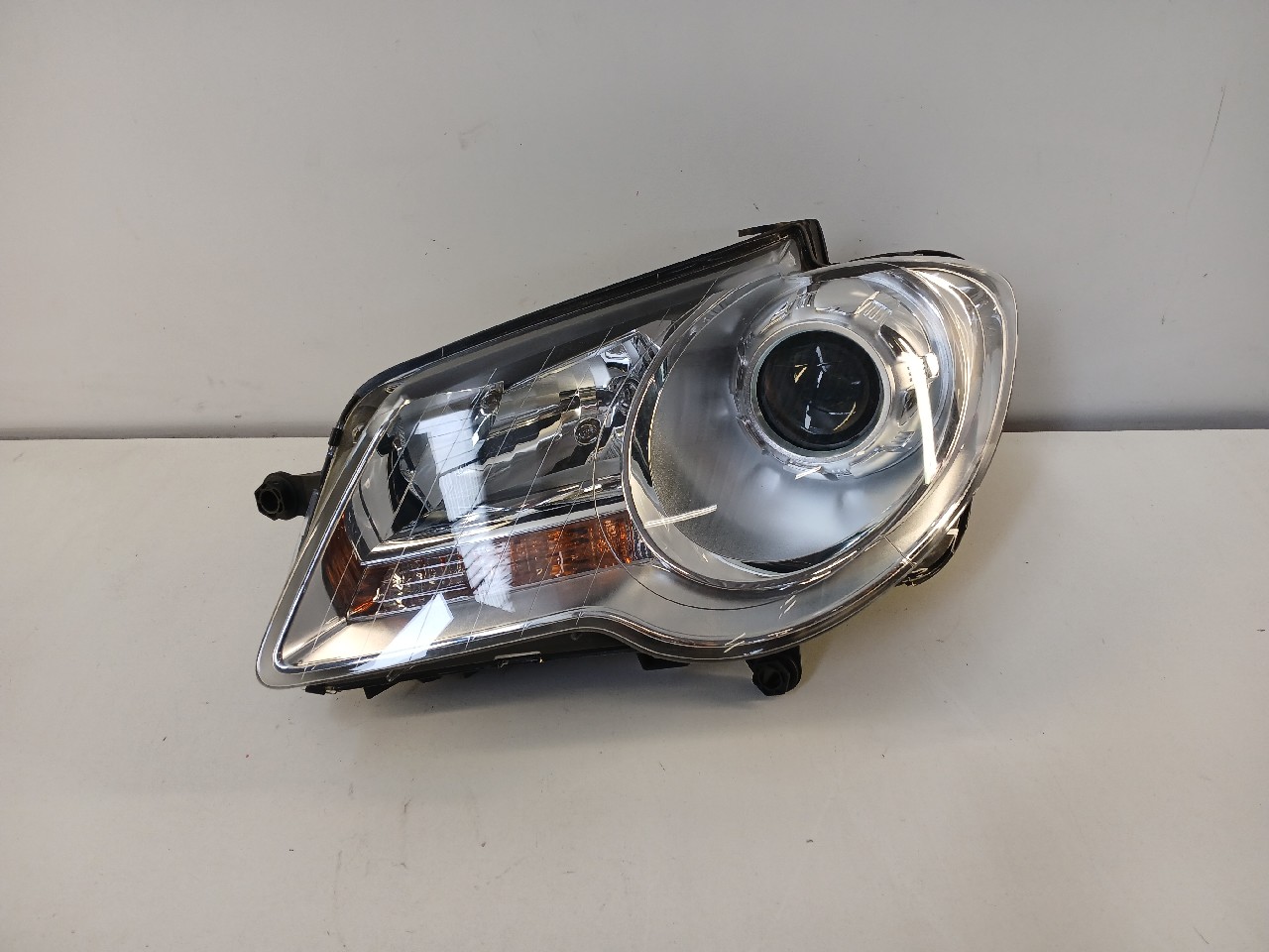 Faro ant sx VOLKSWAGEN TOURAN