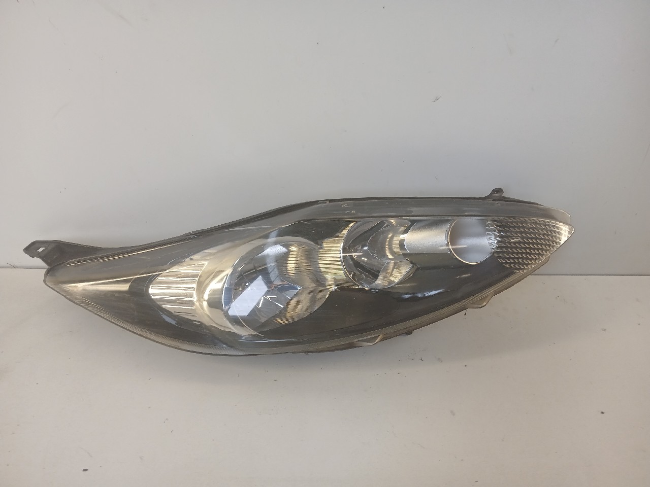 Faro ant dx FORD FIESTA
