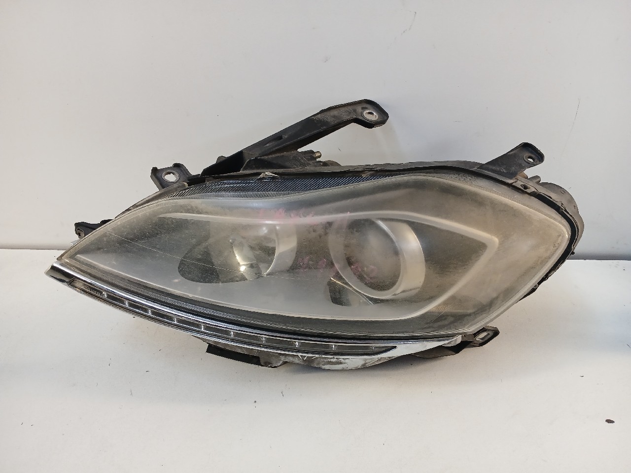 Faro ant sx LANCIA DELTA
