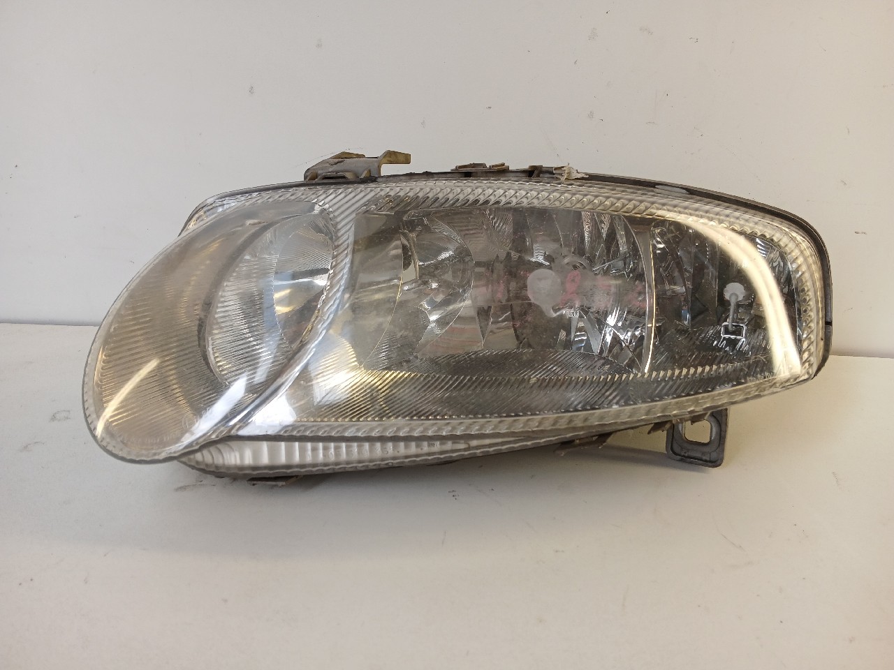 Faro ant sx ALFA ROMEO 147