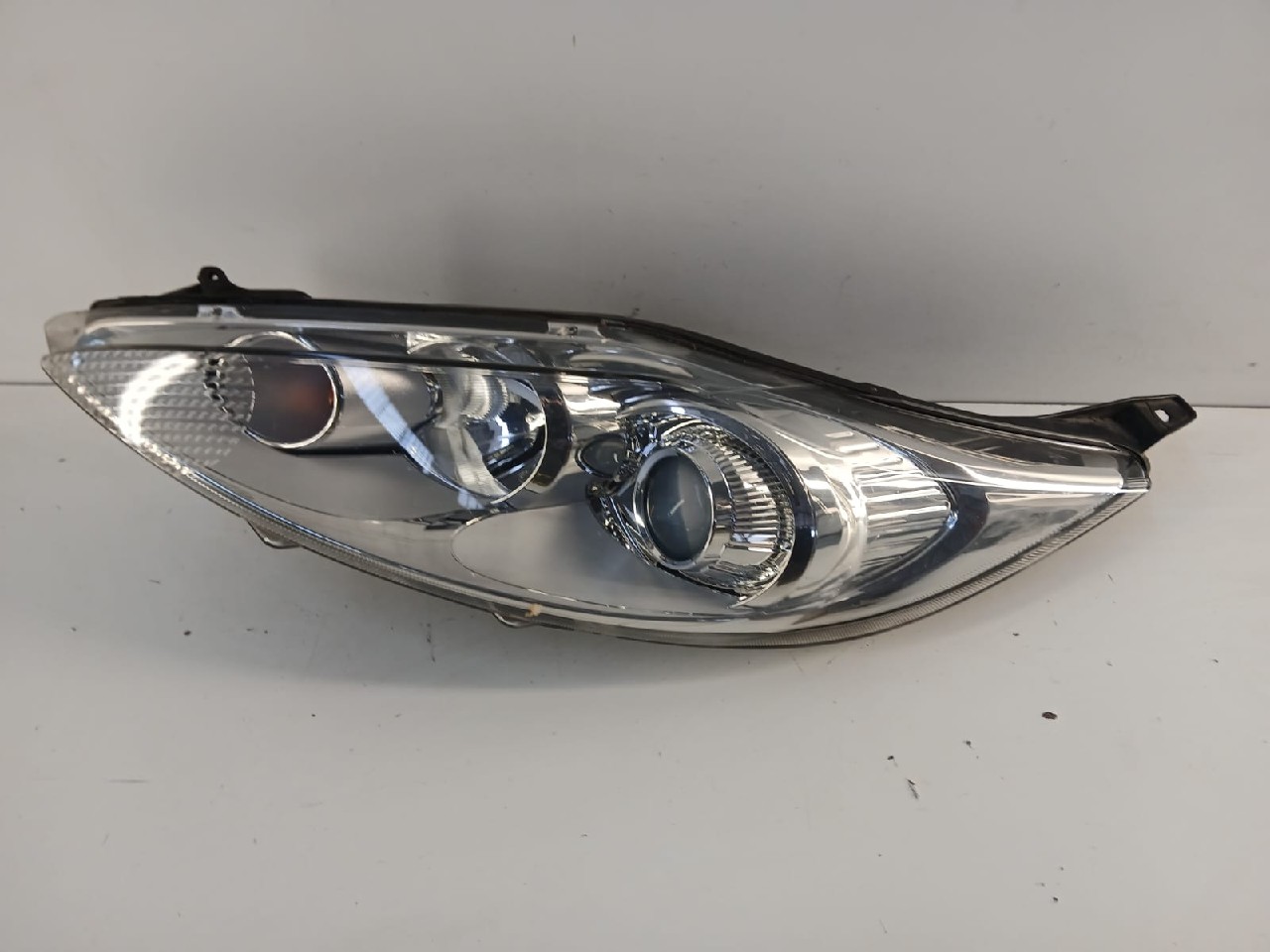 Faro ant sx FORD FIESTA