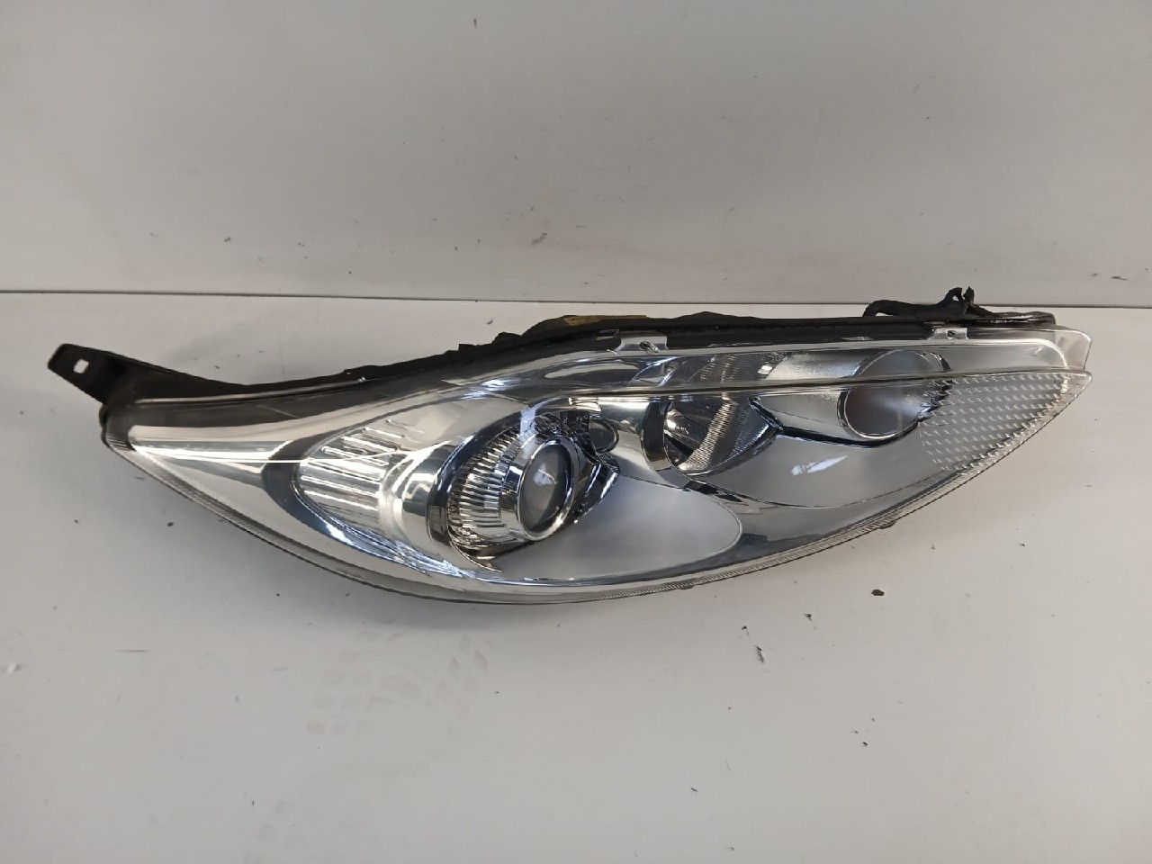 Faro ant dx FORD FIESTA