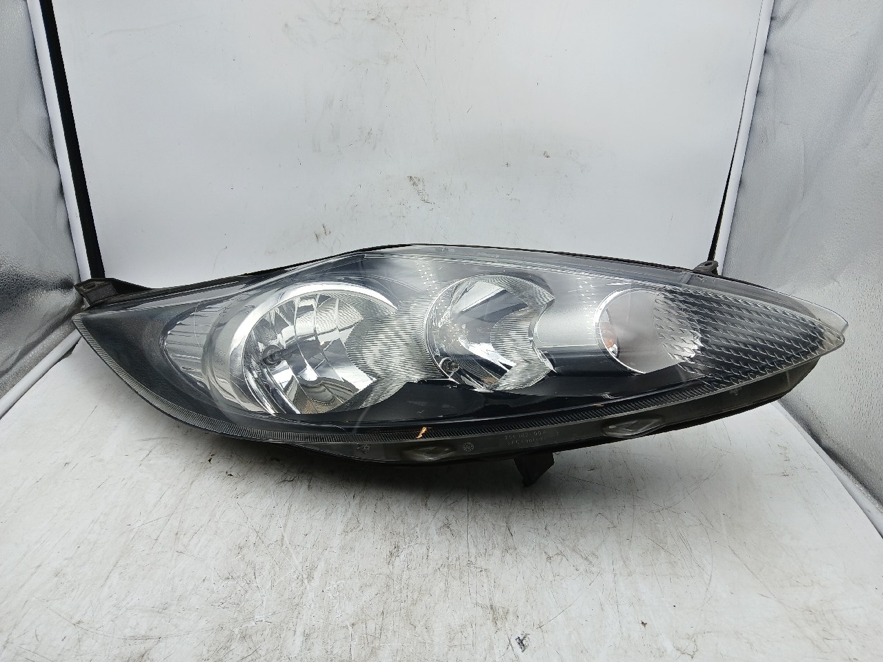 Faro ant dx FORD FIESTA