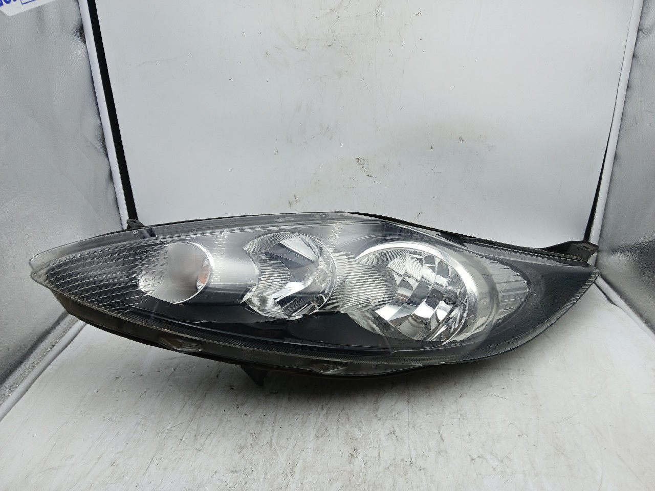 Faro ant sx FORD FIESTA