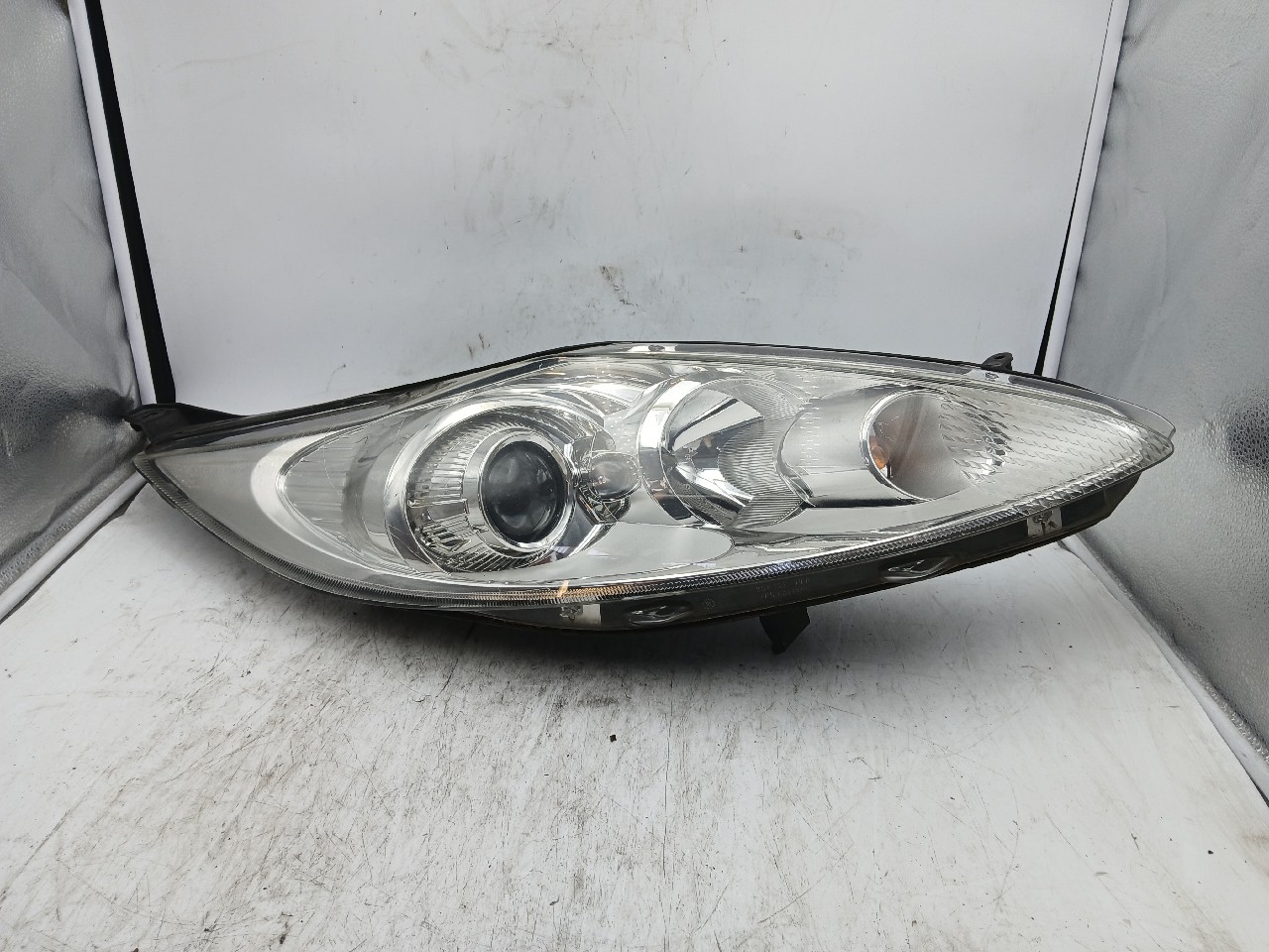 Faro ant dx FORD FIESTA