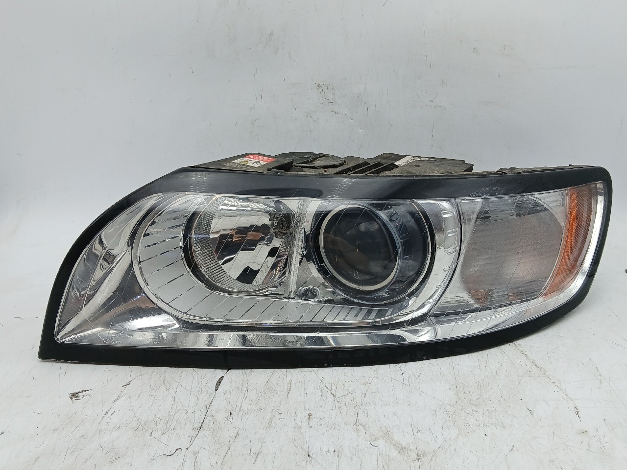 Faro ant sx VOLVO V50