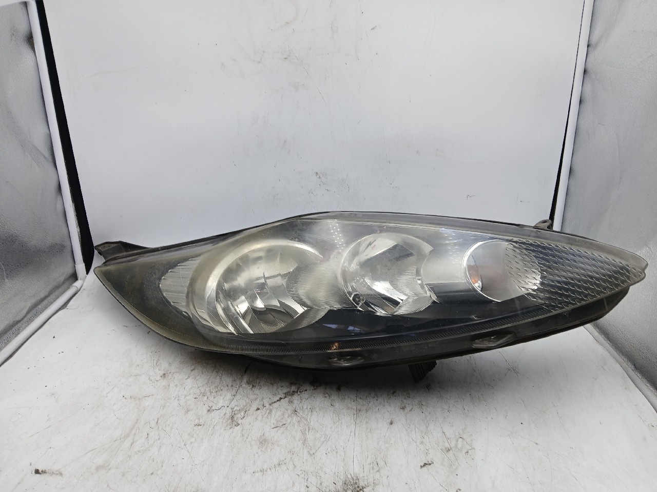 Faro ant dx FORD FIESTA