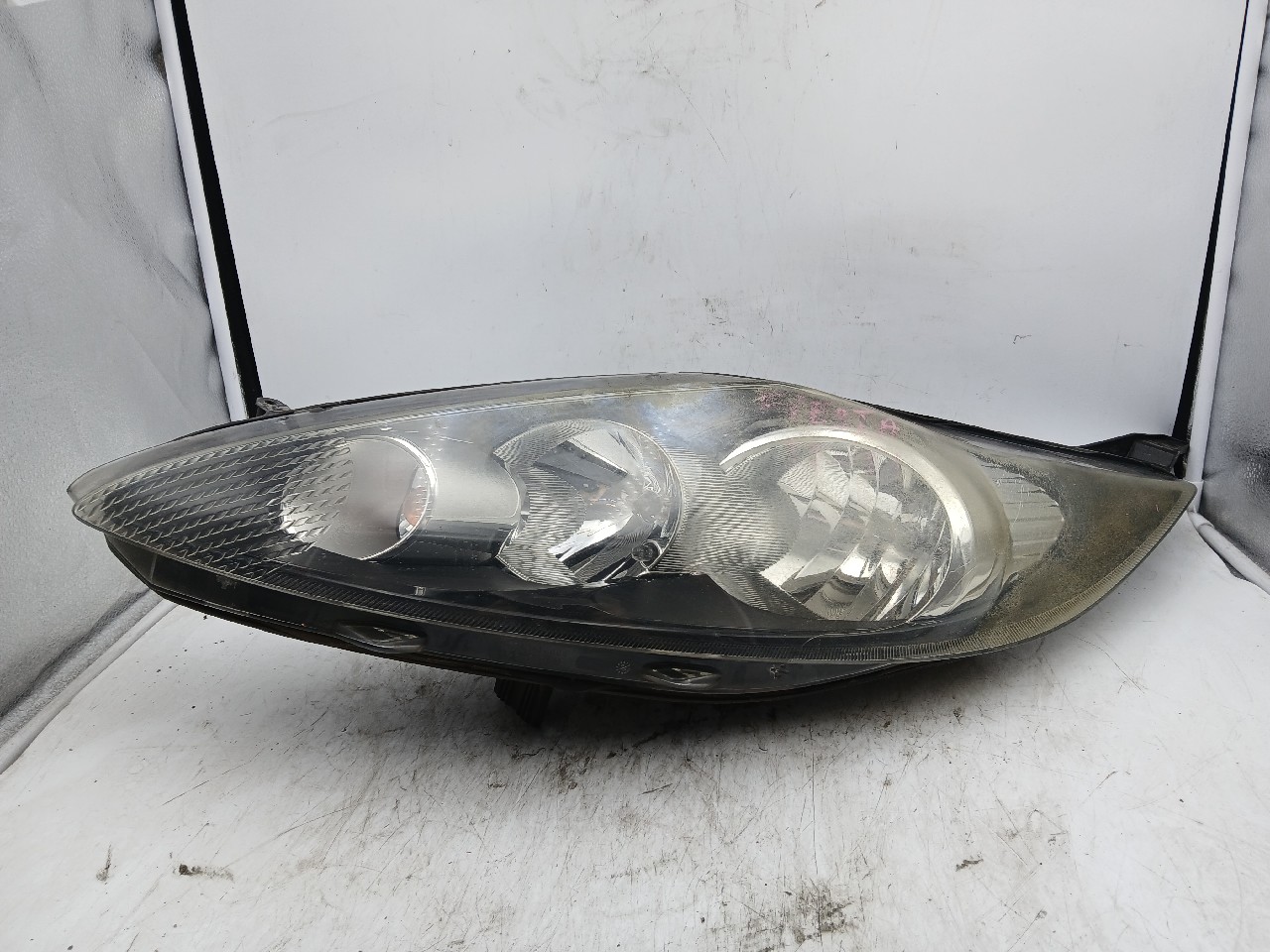 Faro ant sx FORD FIESTA