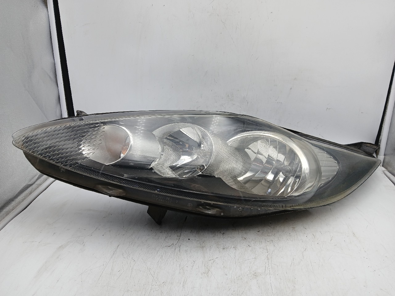 Faro ant sx FORD FIESTA