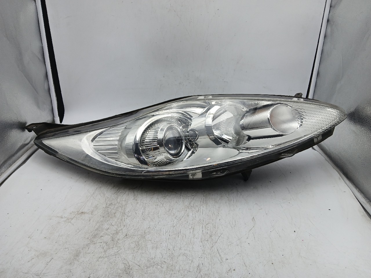 Faro ant dx FORD FIESTA